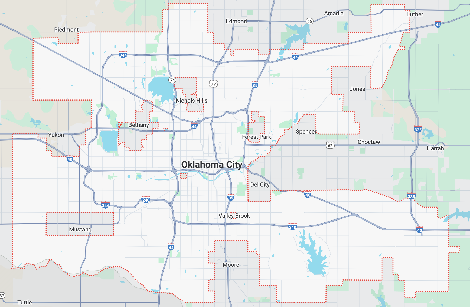 Map of Oklahoma City and surrounding areas, showing roads, highways, and city boundaries with a red dashed line.